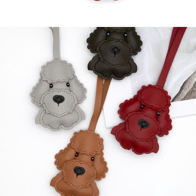 Стильный прочный брелок для ключей из искусственной кожи в виде собаки, аксессуар для украшения автомобиля или сумки с прочным плетеным ремешком для ежедневного использования