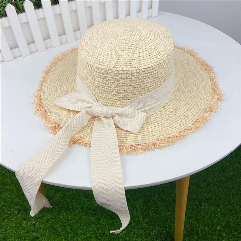 Соломенная шляпа с бантом на ремне для женщин с милыми и элегантными краями с бахромой, солнцезащитная соломенная плетеная шляпа с плоским верхом для лета