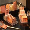 Стеллаж для хранения косметики с прозрачными ящиками для макияжа и теней для век.