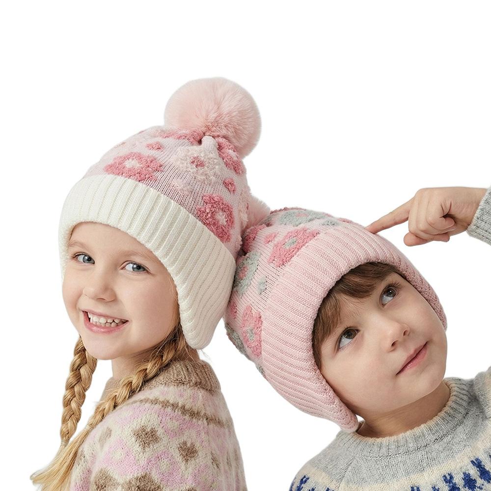 New girls jacquard flower knitted hat winter warm and plush children's hairball ear protection hat