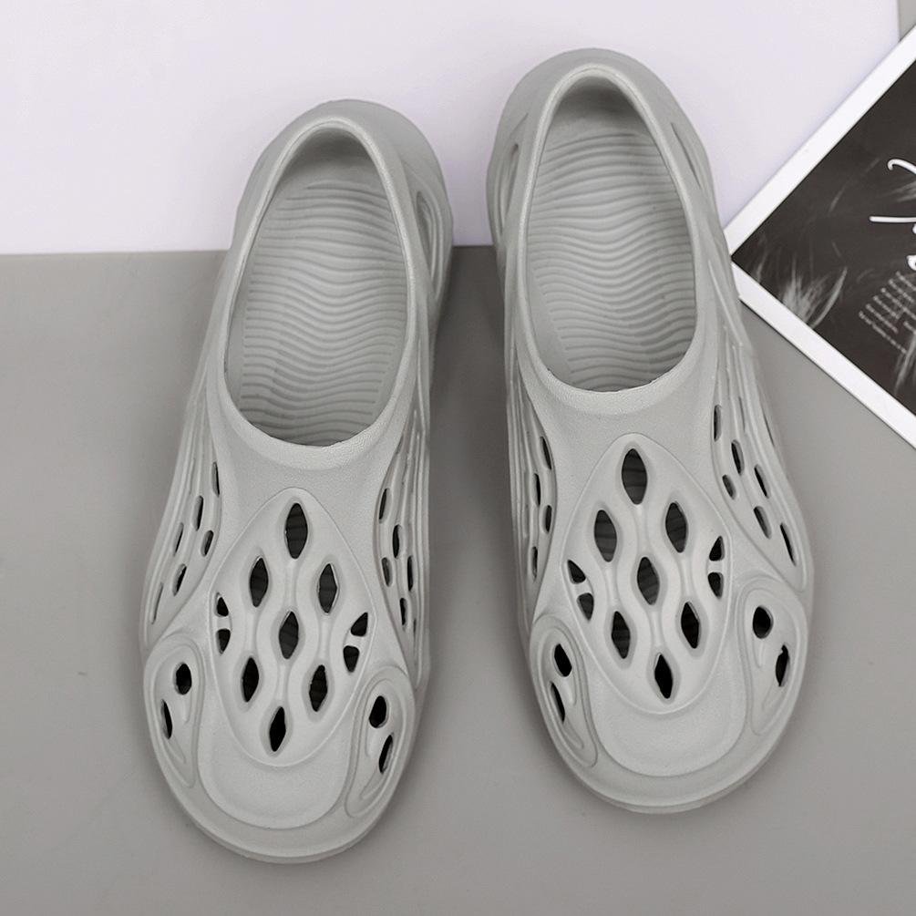 Пара кокосовых дырок обувь мужчины наступают на дерьмо чувство полые сандалии летняя пляжная обувь педаль сумка головные тапочки прилив