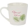 Gift set of a ceramic mug and spoon with flamingos and leaves