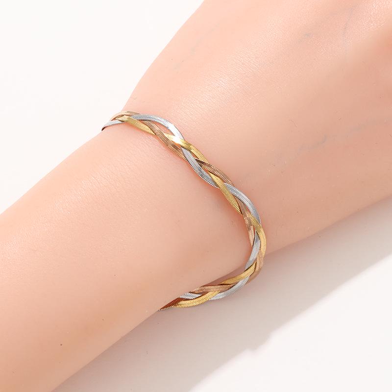 Браслет из розового золота с обмоткой и лезвием из нержавеющей стали