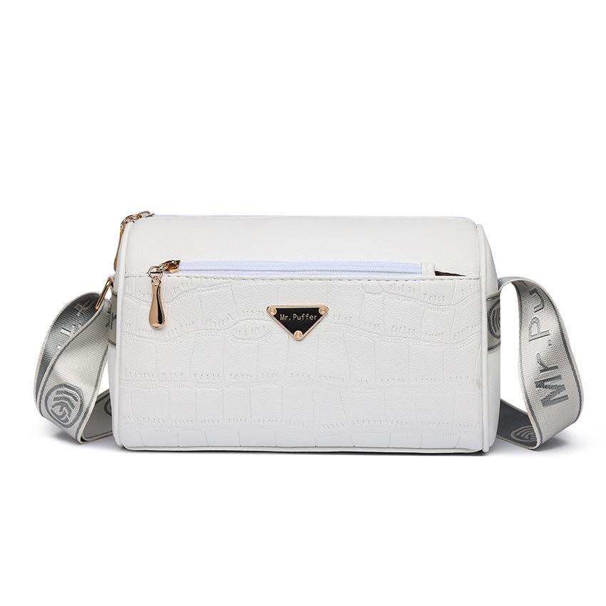 Эта четырехслойная сумка на молнии — стильная женская сумка через плечо и вместительная сумка кросс-боди, популярная у женщин среднего возраста зимой.