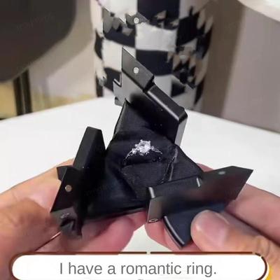 Вращающаяся кинетическая шкатулка для колец Крутой дисплей для хранения ювелирных изделий