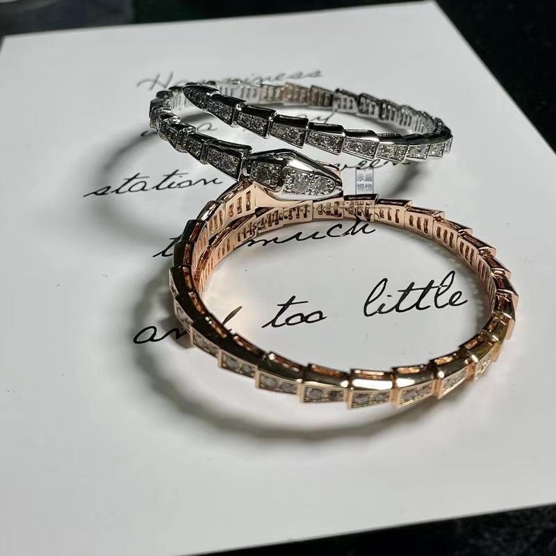 Браслет-змейка с цирконами на пружине для женщин, браслет из змеиных костей с открытой пастью