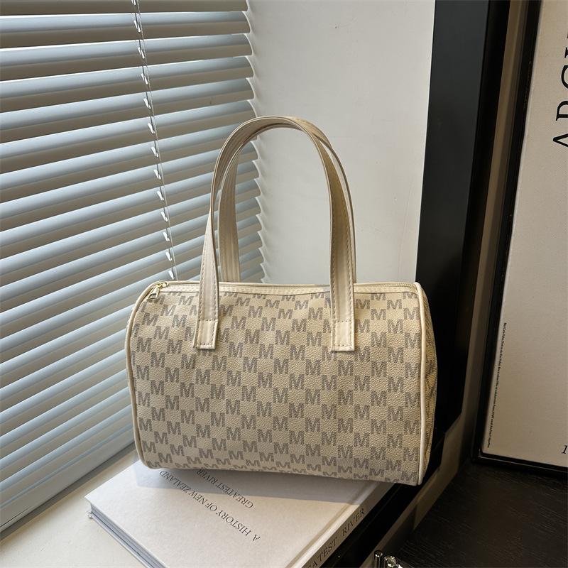 Новая универсальная сумка-тоут для通勤 в стиле ретро большой вместимости модная печать нишевая ручная сумка сумка-подушка