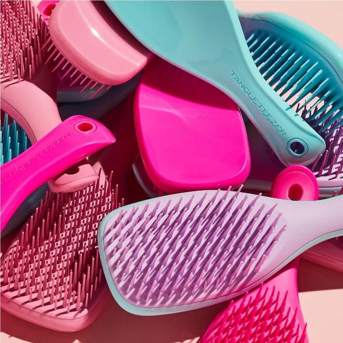 Выберите 1 из 8 мини-расчесок Wet Detangler