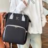 Mommy Bag, a Stylish and Trendy New Design, Offers a Sophisticated Look and Is a Practical, Portable Backpack for Moms To Carry When Going Out