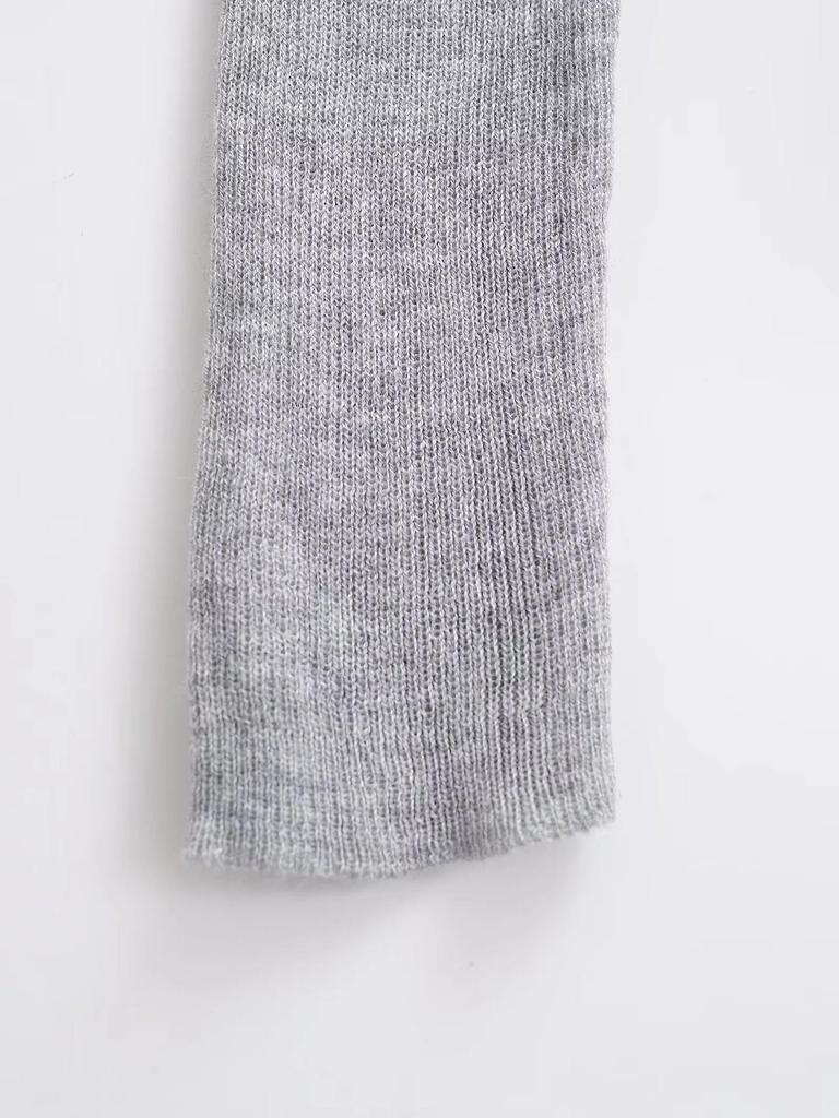 Весна 2025 Трикотаж из шерсти с U-образным вырезом: Прозрачный топ облегающего кроя с длинным рукавом