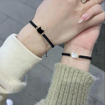 Браслет Xiaohongshu ручной работы с черным и белым котом - Элегантный плетеный шнурок для пары