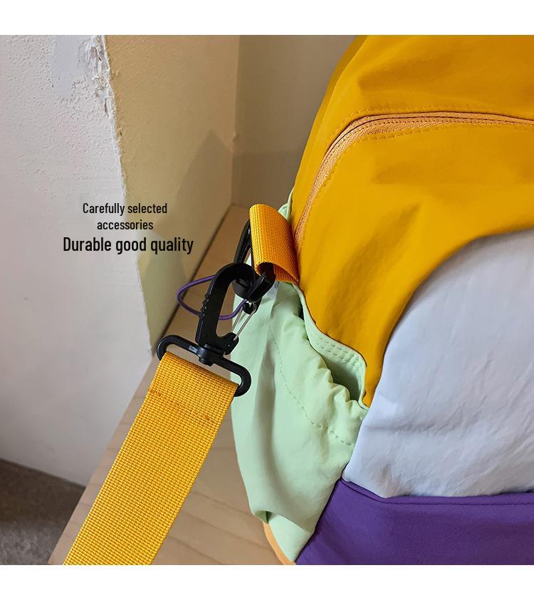 Trendy Color Block Fitness Travel Bag with Wet/Dry Separation, Large Capacity, and Handheld Design.