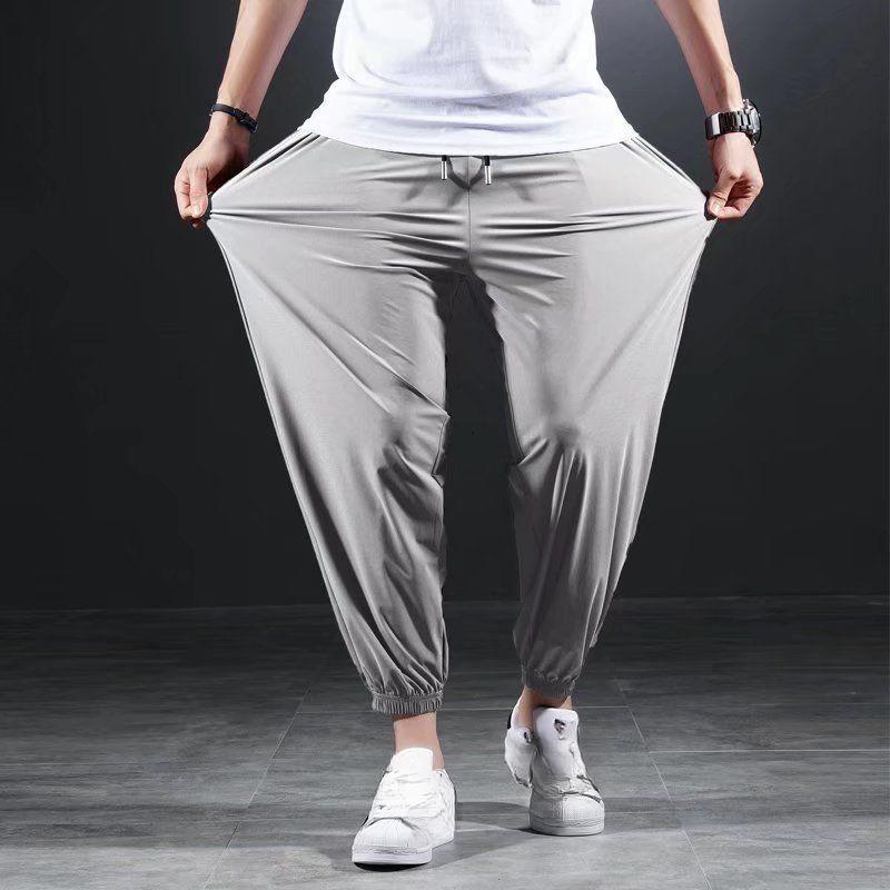 Эластичные повседневные брюки Ice Silk Быстросохнущие мужские летние тонкие спортивные брюки Fat Plus Fat для увеличения свободных ног Брюки Nine Point