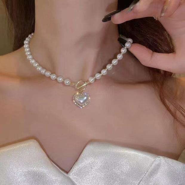 New super fairy temperament imitation pearl love necklace in Japan and South Korea, cold wind, sweet and simple OT buckle collarbone chain woman