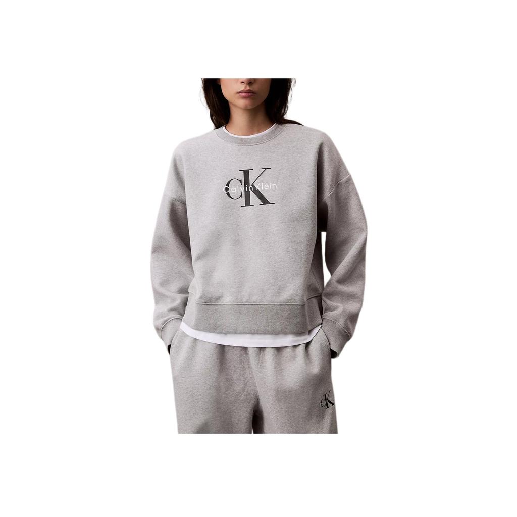 Calvin Klein Повседневный короткий свитер свободного кроя с круглым вырезом, спущенным плечом и длинным рукавом. Женский свитшот серый 47A214G-031
