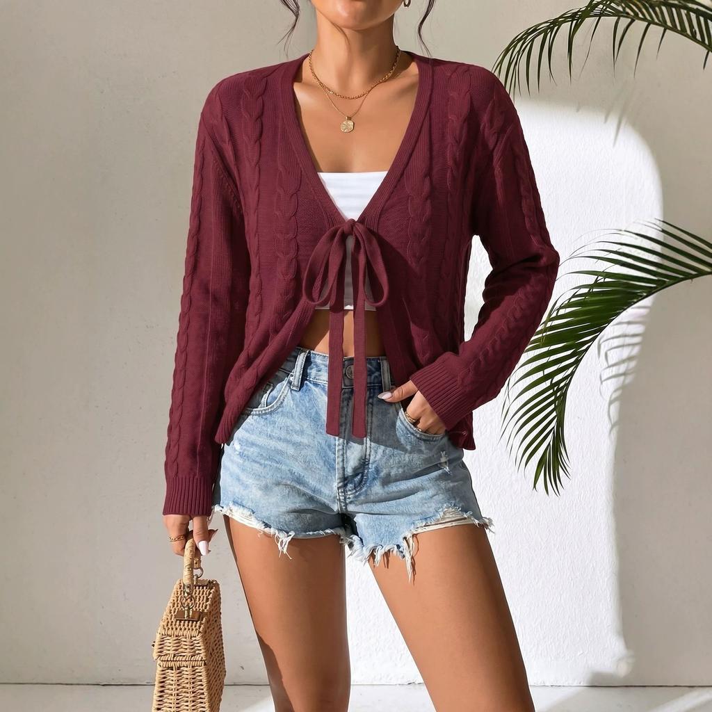 European and American twist knitted cardigan women's early autumn thin V-neck strap bow long-sleeved short sweater jacket