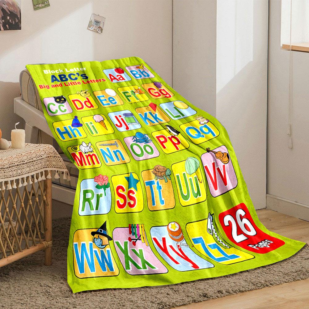 The pattern pairs uppercase and lowercase letters with corresponding images. for all seasons blanket lunch break throw gift