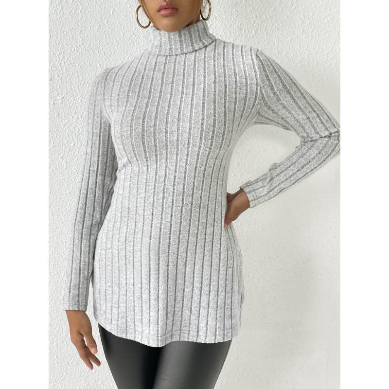 Женский свитер средней длины с высоким воротом и разрезом, осень/зима