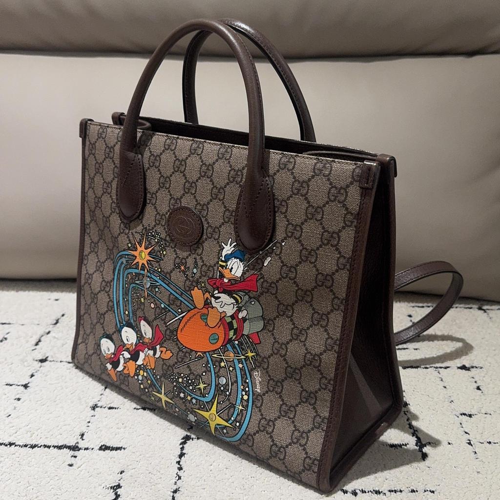 [Pre-Owned] X Disney Donald Duck Print Large Capacity Canvas And Leather Tote Bag - Very Good #1D3JMIM