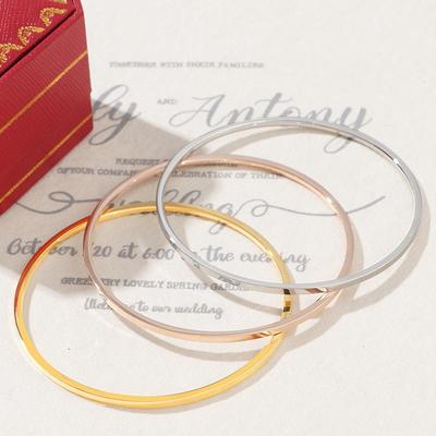 Новый гладкий браслет из титановой стали: Тонкий многокольцовый браслет с покрытием из 18-каратного золота для женщин - не выцветает.