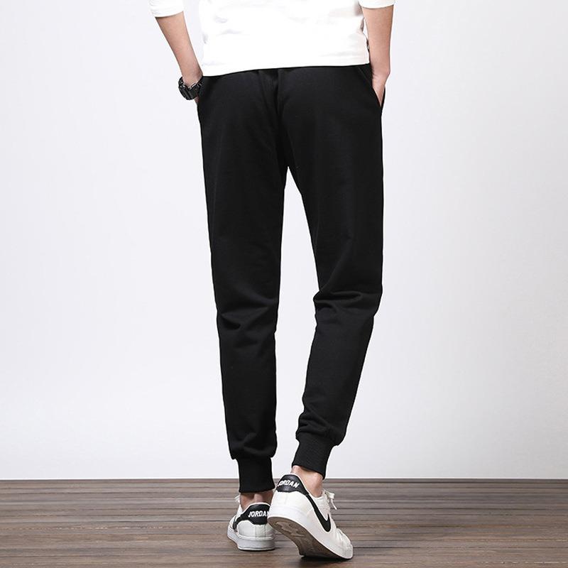Повседневные брюки мужские летне-осенний тренд зауженные большого размера показывающие рост свободные жир однотонные спортивные на резинке девятиточечные брюки универсальные