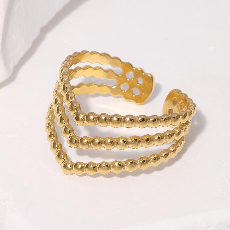 Открытое кольцо из нержавеющей стали с покрытием из 18-каратного золота: Простой, универсальный, нишевый дизайн, стойкий к выцветанию титановый стальной корпус.