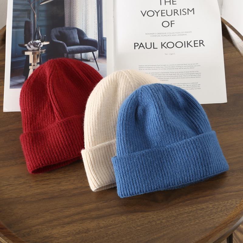 Women's autumn and winter solid-color, fleece-lined, warm knitted hat for outdoor activities, cycling, and cold weather protection, with ear flaps