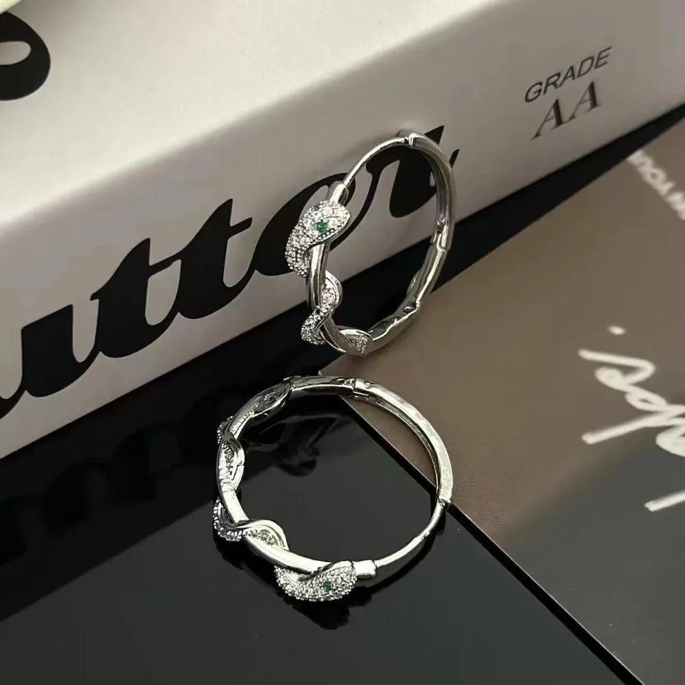 Серьги-кольца из серебристой нержавеющей стали со змеей, цирконами, для женщин. Изысканные модные ювелирные изделия. Подарок.