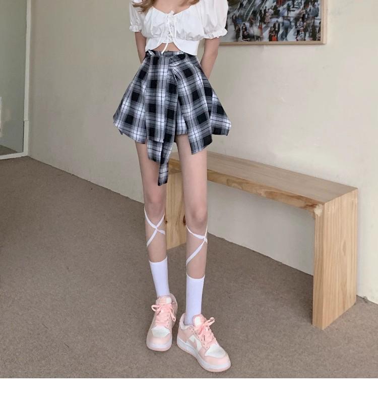 Женская черная клетчатая юбка-шорты А-силуэта 2025 года с асимметричным дизайном из двух частей