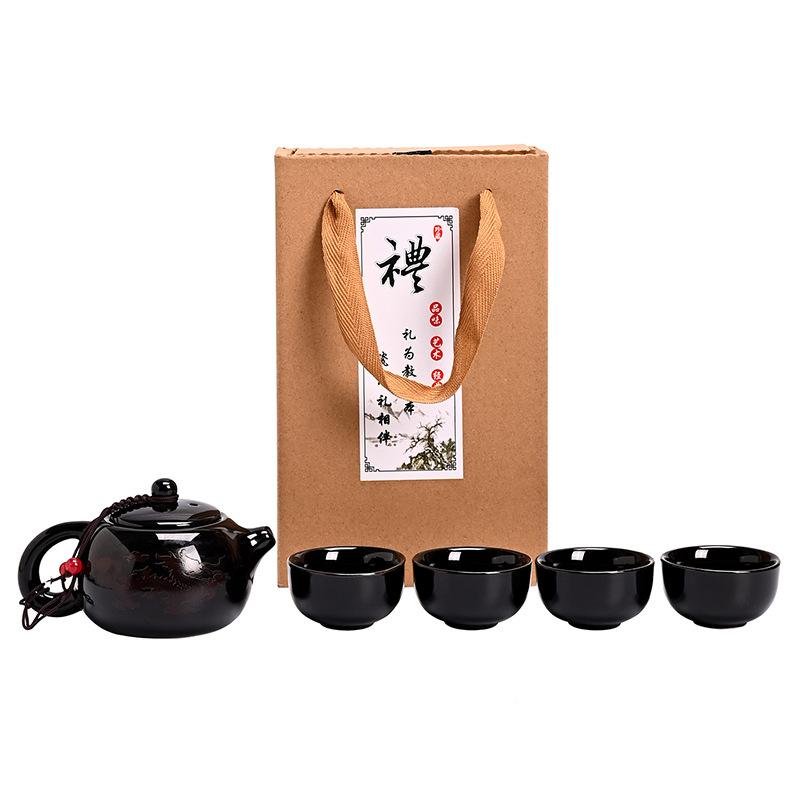 Color-changing dragon and phoenix kung fu tea set, a complete set of cowhide boxes, a pot of four cups of teapots, a gift for making teapots, small