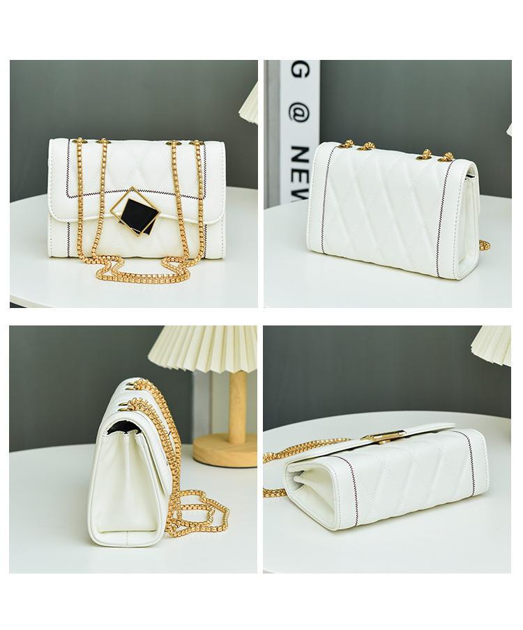 Женская стеганая сумка кроссбоди на цепочке с вышивкой в ромбовидный узор