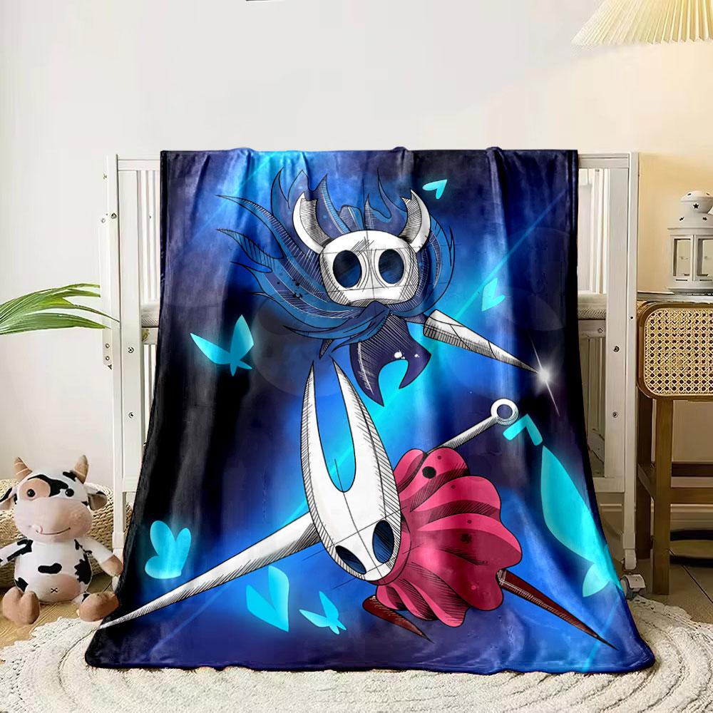 Two horned characters with sharp weapons, surrounded by glowing blue shapes. for all seasons blanket lunch break throw gift