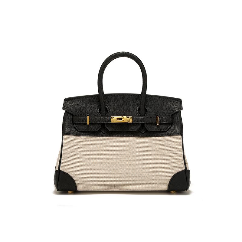 Весна 2025 г. Женская сумка через плечо из кожи и холста контрастного цвета