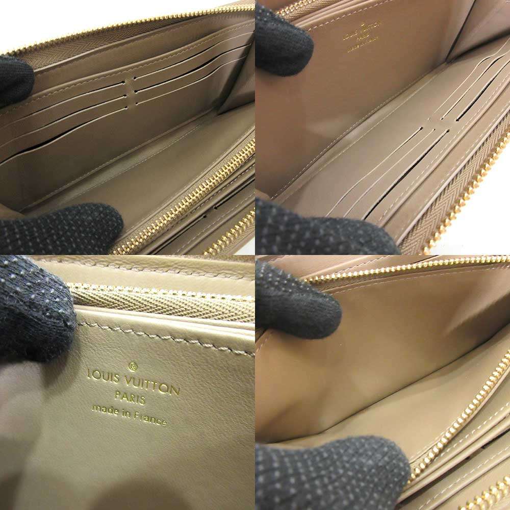 Used LOUIS VUITTON EmbossingPurse leather Women
