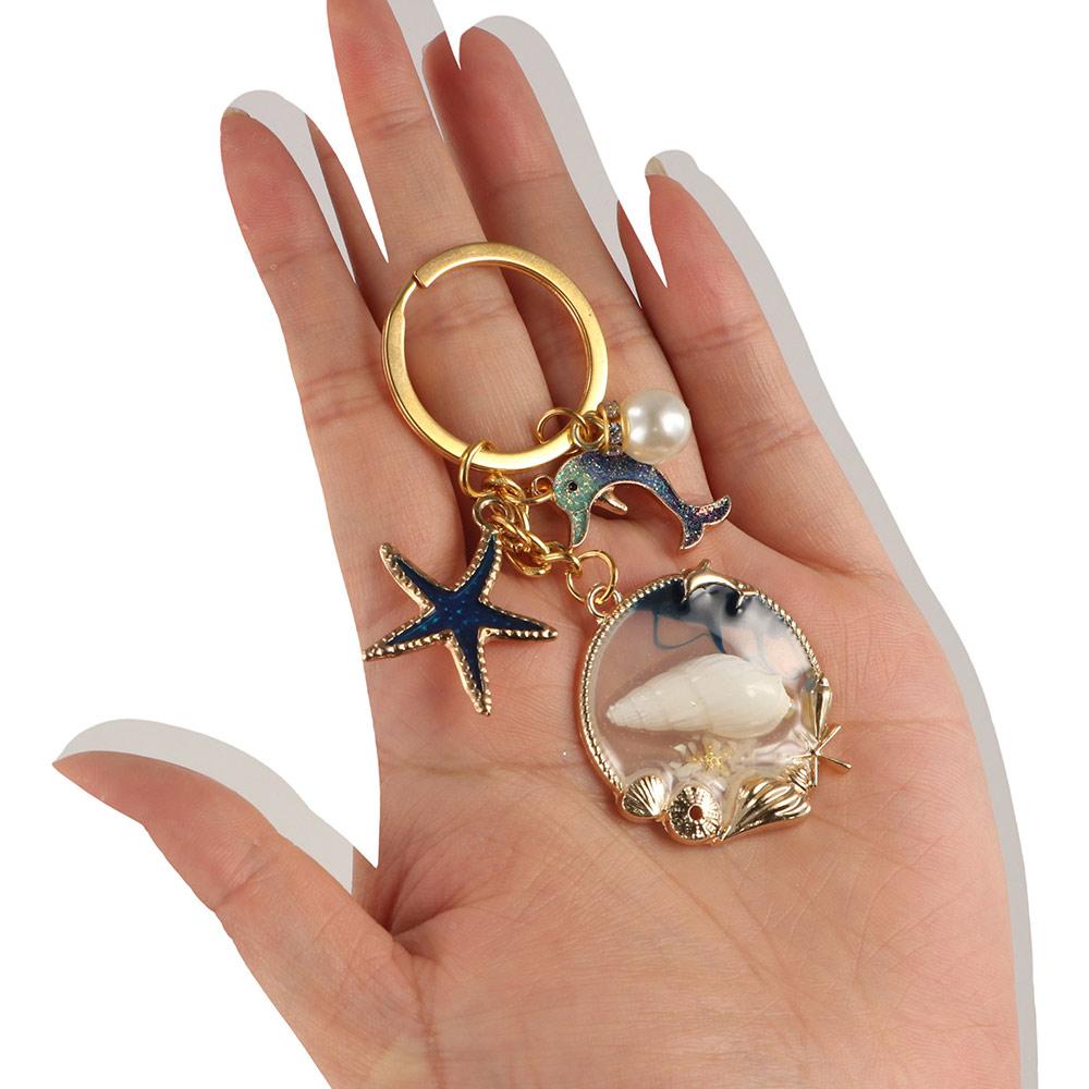 Брелок с жемчугом и дельфином, модные подвески на морском пляже, новый брелок с ракушкой и звездой унисекс