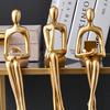 Роскошный абстрактный орнамент в виде сидящей фигуры для ТВ-тумбы или книжной полки