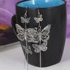 "European & American Fashion Butterfly Tassel Earrings: Long, Hollow & Exaggerated Design"