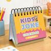 Календарь детских анекдотов на 2026 год с отрывными страницами, содержащими ежедневные каламбуры и шутки. Небольшой настольный календарь в подарок детям.