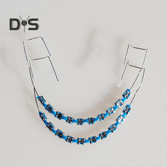 Temporary Tooth Decoration with Metal Wires Brackets Orthodontic Ligatures Orthodontists Explain Dental Students Practice Props