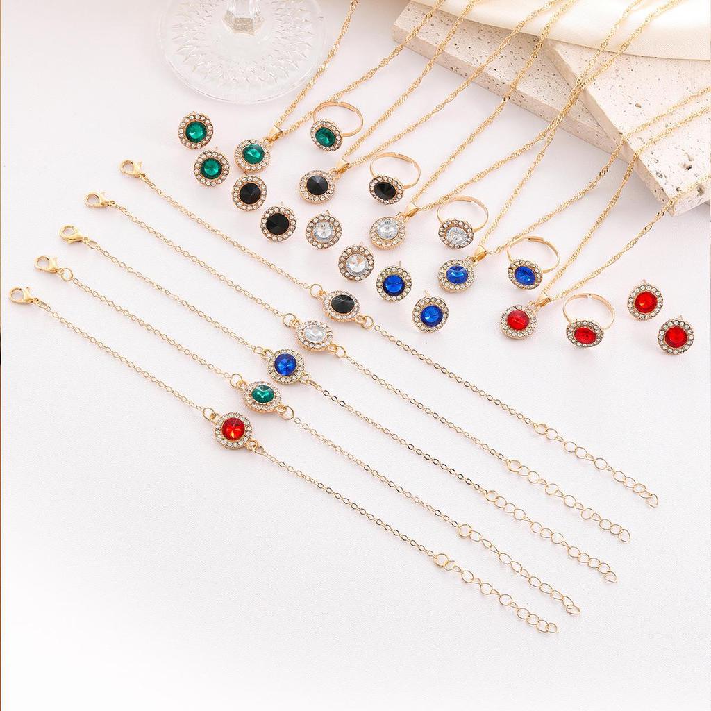 Elegant Jewelry Set: Diamond Earrings, Necklace, Bracelet, Ring, and Watch