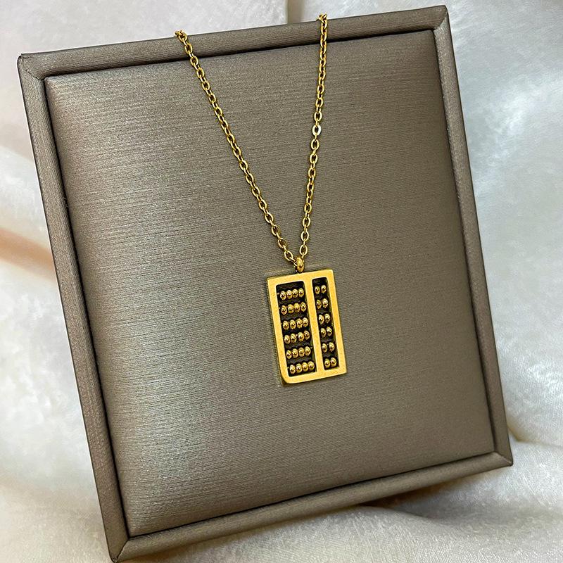 Позолоченная медь 18 карат, цепочка на ключицу с дизайном абака, тыквы-горлянки и лебедя.