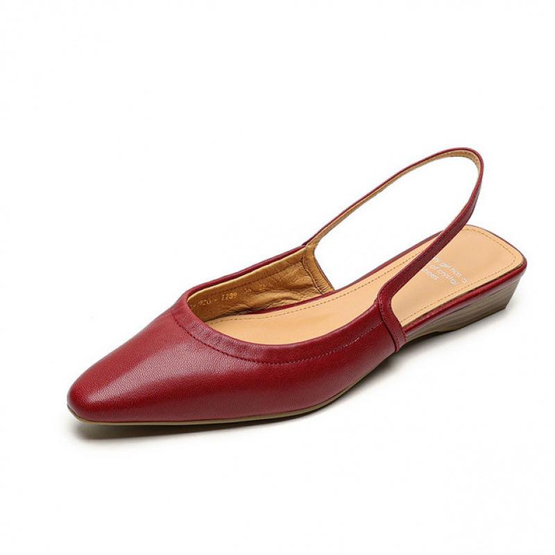 Korean Version Women's Flat-soled Sandals Summer Leather Bag Head Sandals Korean Version Comfortable Soft Sole Large Size Rear Empty Sandals Pointed T