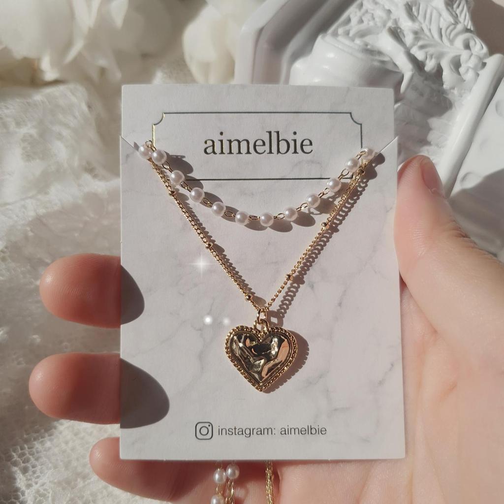 Золотое многослойное колье с кружевным сердцем