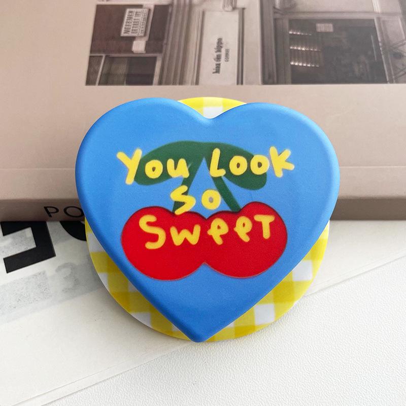 Heart-Shaped Cartoon Film MagSafe Compatible Desktop Holder with Retractable Airbag