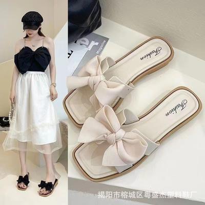 2024 Новые тапочки с бантом для женской летней верхней одежды, модные домашние тапочки с плоской подошвой и противоскользящим эффектом, роскошная женская обувь