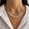 Retro Heart Pearl Gold Necklace Set: 3-Piece Multi-layer Stackable Clavicle Chains for Women