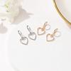 Simple Hollow Love Earrings Small Fresh Wild Metal Peach Heart Earrings Cute Female Jewelry