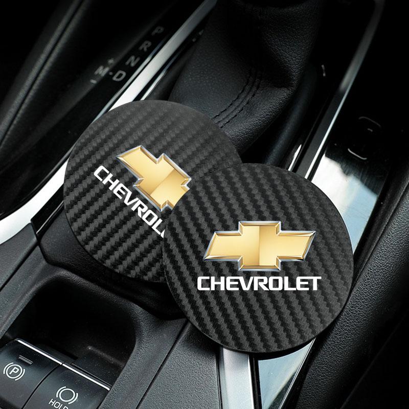 EII3   2Pcs Car Carbon Leather Water Cup Pad Anti Noise Coaster Mat For Chevrolet Silverado Camaro Tahoe Equinox Suburban Cruze Malibu