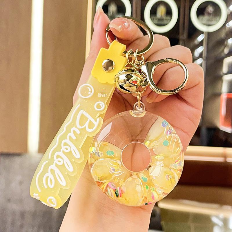 Luminous Oil-Filled Donut Quicksand Keychain: Exquisite Car Pendant & Bag Accessory, Ideal for Gifts.