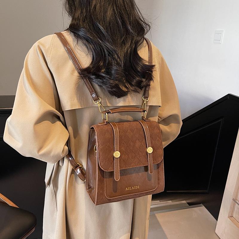 Премиальный ретро женский рюкзак 2025 новый контрастных цветов универсальный маленький рюкзак модный дорожный маленький школьный рюкзак